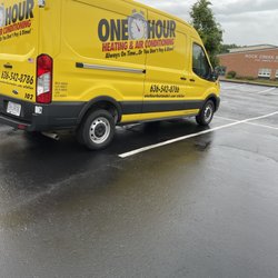 One Hour Heating and Air Conditioning - Picture of our service van with logo and phone number