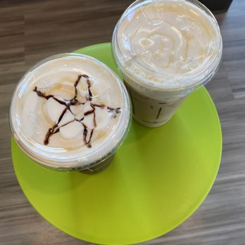 Biggby Coffee - two iced coffees on a green plate - Coffee & Tea Near Me - Cincinnati, Ohio