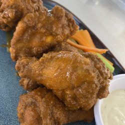Amadeus Sport Bar and Grill - Buffalo chicken wings, made with our homemade creamy Buffalo sauce!