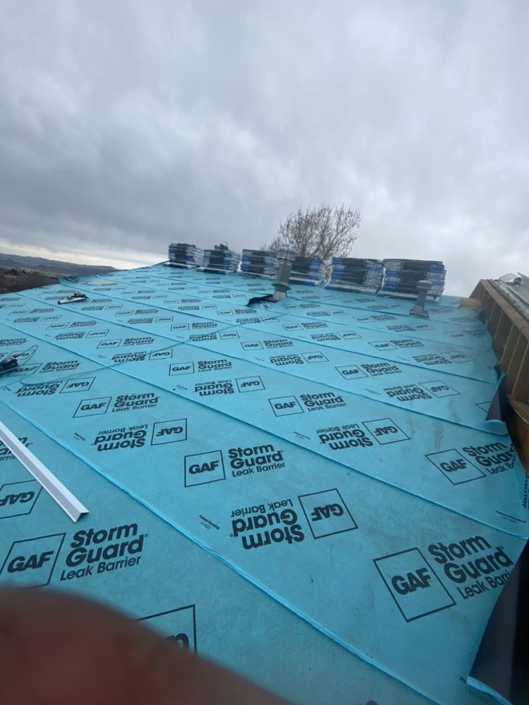 Slide of Manny's Metal Roofing