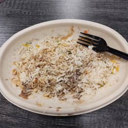 3 Pepper Burrito Co - Inch of plain, flavorless white rice left in the bowl after I'd eaten some of it and everything that had been on top.