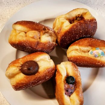Sonrisa Donuts - Nutella, Thai milk tea, marionberry pistachio, birthday cake, blueberry cheesecake crumble - Donuts Near Me Sonrisa Donuts - Nutella, Thai milk tea, marionberry pistachio, birthday cake, blueberry cheesecake crumble - Donuts Near Me