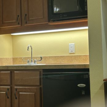 Solera At West Houston - No one. This a picture of the counter, sink, cabinet,, microwave and fridge - Skilled Nursing Near Me - Houston, Texas Solera At West Houston - No one. This a picture of the counter, sink, cabinet,, microwave and fridge - Skilled Nursing Near Me - Houston, Texas