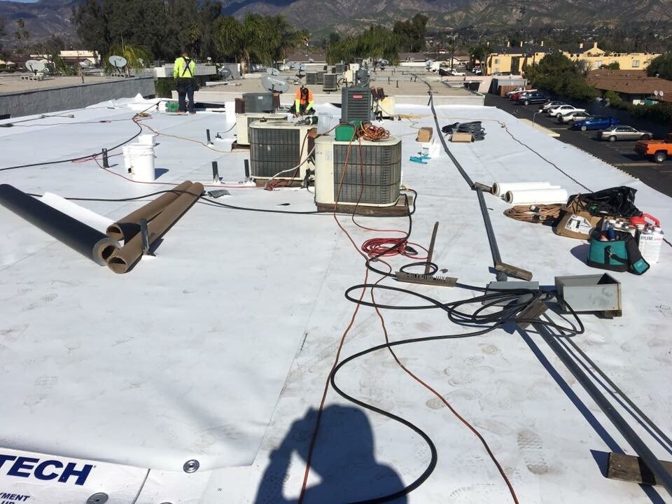 Slide of Tony and Velasco Roofing Constructions