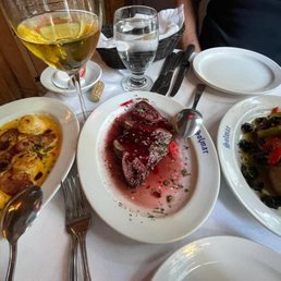 Trio of tapas (from left): scallops and chorizo, duck in fig sauce, octopus with grilled peppers and olives. Trio of tapas (from left): scallops and chorizo, duck in fig sauce, octopus with grilled peppers and olives.