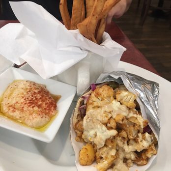 Pom & Olive - The Cauliflower Shawarma Wrap! My favorite! It's so good!! Very flavorful! :) - Mediterranean Near Me - Costa Mesa, California Pom & Olive - The Cauliflower Shawarma Wrap! My favorite! It's so good!! Very flavorful! :) - Mediterranean Near Me - Costa Mesa, California