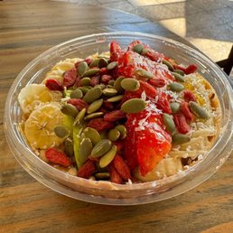 Açaí bowl with strawberry, banana and apple ... topped with seeds!
