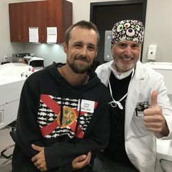 Katzen Eye Care & Laser Center - Dr. Luchs with a happy LASIK patient.