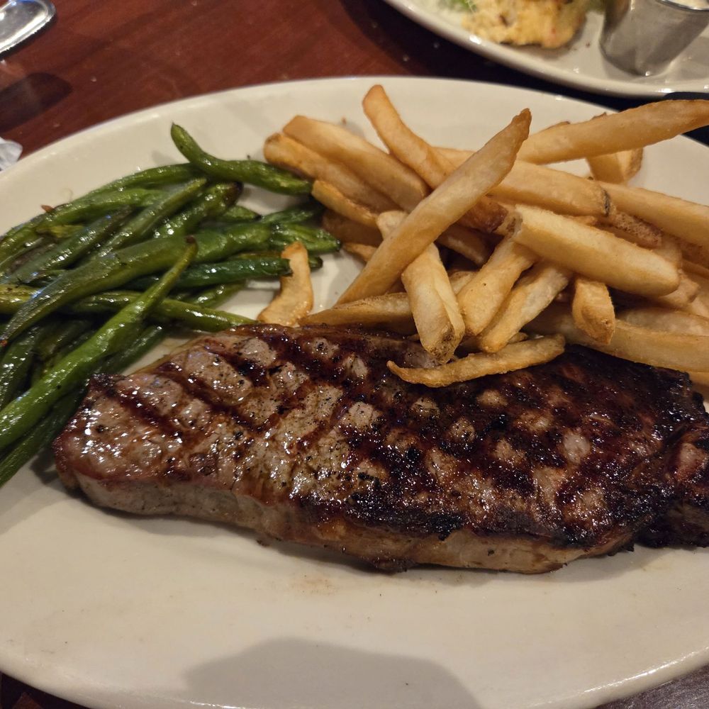 Black Angus Steakhouse - New york strip with fries and green beans - Steakhouses Near Me - Whittier, California