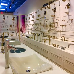 H2O Kitchen & Bath - Kohler Premier showroom featuring sink faucets, fixtures and vanities.