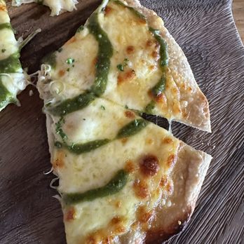 Grace O'Malley's - Cheese pizza bread with pesto - Irish Near Me - Whitianga, AUK Grace O'Malley's - Cheese pizza bread with pesto - Irish Near Me - Whitianga, AUK