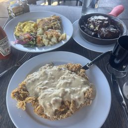 Chicken fried steak, chocolate gravy biscuit. Good luck, finishing it all. Chicken fried steak, chocolate gravy biscuit. Good luck, finishing it all.