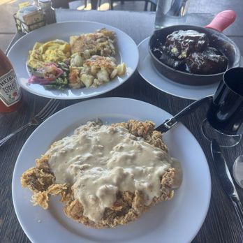 The Daily Nosh - Chicken fried steak, chocolate gravy biscuit. Good luck, finishing it all. - Breakfast & Brunch Near Me - Roseville, California The Daily Nosh - Chicken fried steak, chocolate gravy biscuit. Good luck, finishing it all. - Breakfast & Brunch Near Me - Roseville, California