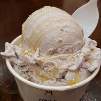 Photo of Cauldron Ice Cream - Santa Ana, CA, United States. Medium cup ($5.50) of earl grey lavender, which comes with honey on top.