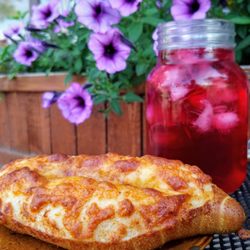 True Grain Bread - Cheesy Pretzel with slow brewed organic iced tea.