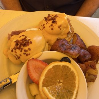 Immigrant Son Caffe - Special eggs Benedict with crispy pancetta on top, fruit and potatoes - Breakfast & Brunch Near Me - Oxnard, California Immigrant Son Caffe - Special eggs Benedict with crispy pancetta on top, fruit and potatoes - Breakfast & Brunch Near Me - Oxnard, California