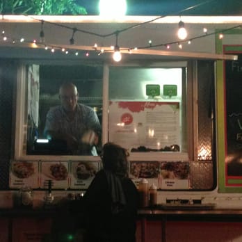 Mediterranean Grill - Salam helping someone out - Food Trucks Near Me - Haiku, Hawaii Mediterranean Grill - Salam helping someone out - Food Trucks Near Me - Haiku, Hawaii