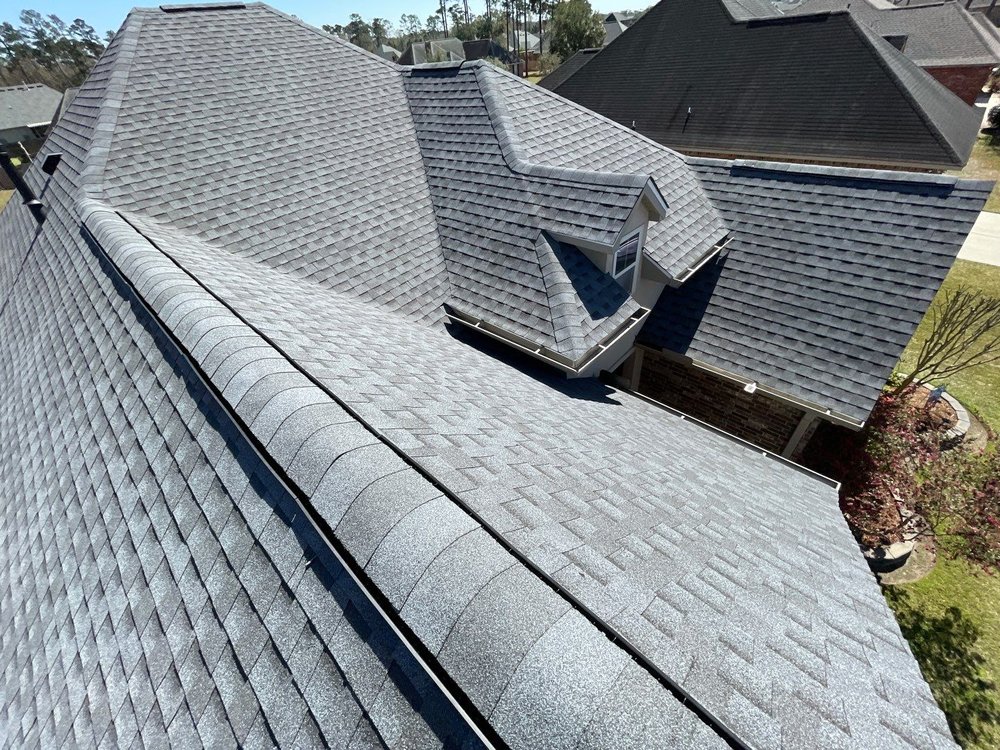 Slide of Coastal Roofing