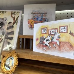 Tons of independent artists' work for sale in the back of the shop