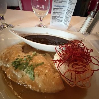 The Cuban - Chicken with garlic and a very salty sauce - Cuban Near Me - Garden City, New York The Cuban - Chicken with garlic and a very salty sauce - Cuban Near Me - Garden City, New York