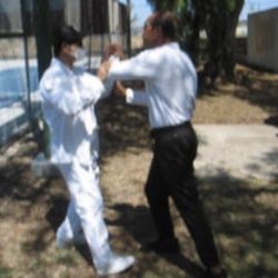 Tai Chi Wellness Center - 2 Students Practice Push Hands (Photo from video)