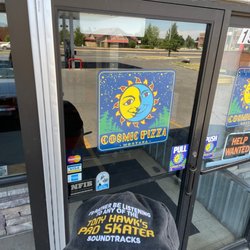 Cosmic Pizza - Me plus pizza signage and bonus Tony hawk hat.