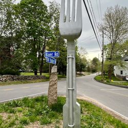 Fork In The Road - The Fork in the Road is an 11 Foot Tall Wooden Silver Statue that points upward. It's a Cool Roadside Attraction in Westport MA.