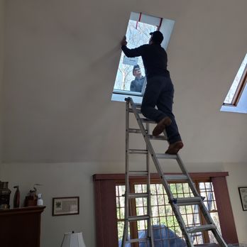 Ferschke Construction - Mark positioning new skylight - Roofing Near Me - Smithfield, Rhode Island