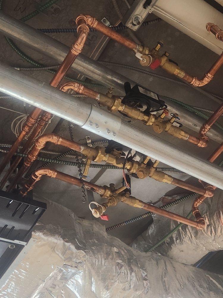 Slide of REM Plumbing & Heating