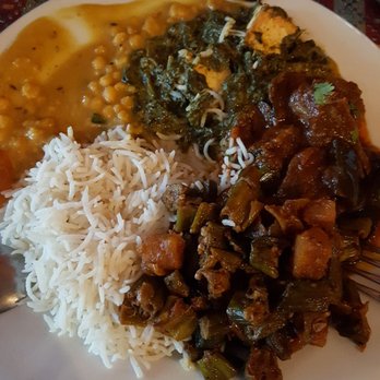 Aangan - clockwise from bottom left: basmati rice, dal, saag paneer, bheda ra bhenta and spicy okra - Indian Near Me - Albany, California Aangan - clockwise from bottom left: basmati rice, dal, saag paneer, bheda ra bhenta and spicy okra - Indian Near Me - Albany, California