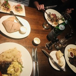 Clockwise: Tina tacos, house special, New York stop, sirloin Oscar and bread