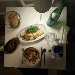 Eleos Restaurant - Greek salad, grilled octopus, grilled sea bass. AMAZING.