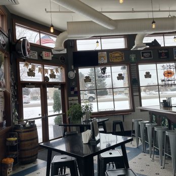 The Harp - a view of a restaurant with tables and stools - Irish Pub Near Me - Meridian, Idaho The Harp - a view of a restaurant with tables and stools - Irish Pub Near Me - Meridian, Idaho