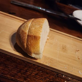 Our Table American Bistro - Complimentary bread (whats left of it!) - New American Near Me - Bargersville, Indiana Our Table American Bistro - Complimentary bread (whats left of it!) - New American Near Me - Bargersville, Indiana