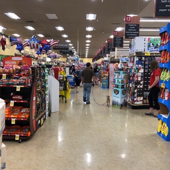 Safeway - a man walking down the aisle of a grocery store - Grocery Near Me - Redding, California