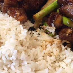 Plate meal with orange chicken, Shanghai angus steak and white rice