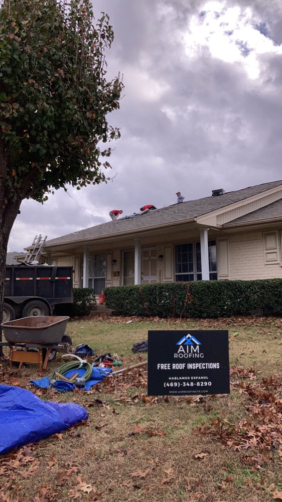 Slide of AIM Roofing