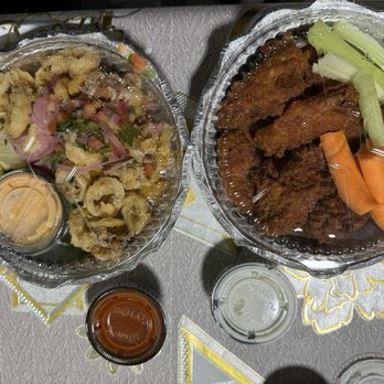 Lime & Salt - Fried Calamari on the left and Wings on the right - New Mexican Cuisine Near Me - Rego Park, New York Lime & Salt - Fried Calamari on the left and Wings on the right - New Mexican Cuisine Near Me - Rego Park, New York