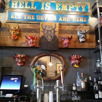Taco Diablo - Wall behind the bar - "He'll is empty. All the devils are here." - Mexican Near Me - Evanston, Illinois Taco Diablo - Wall behind the bar - "He'll is empty. All the devils are here." - Mexican Near Me - Evanston, Illinois