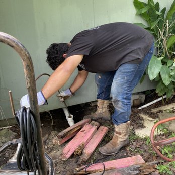 GM Plumbing - Antonio snaking a drain line - Plumbing Near Me