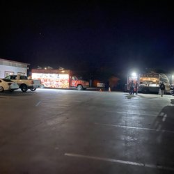 The 128 hall and kitchen - Parking lot with food trucks