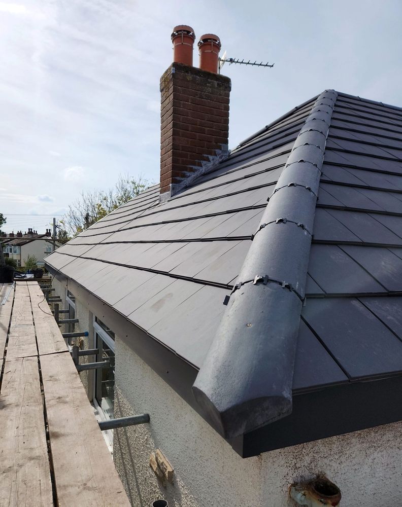 Slide of North Shattuck Roofing