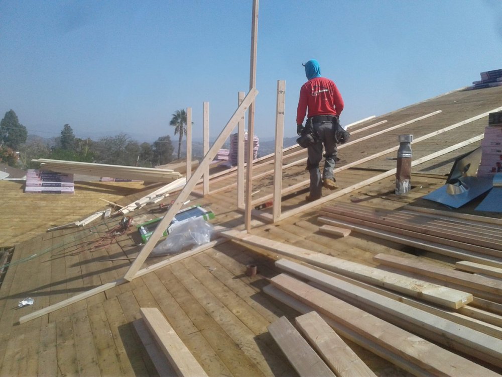 Slide of JD Roofing Service