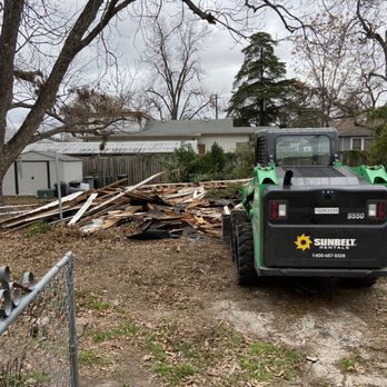 Superior Dryout & Mitigation - a forklift in a yard - Damage Restoration Near Me