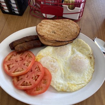 Red Rooster - 2 eggs and sausage (added an extra egg) with wheat toast and sliced tomatoes - Diners Near Me - Marco Island, Florida Red Rooster - 2 eggs and sausage (added an extra egg) with wheat toast and sliced tomatoes - Diners Near Me - Marco Island, Florida