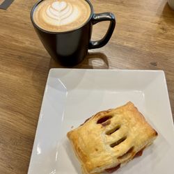 Cafe con leche and guava and cream cheese pastelito