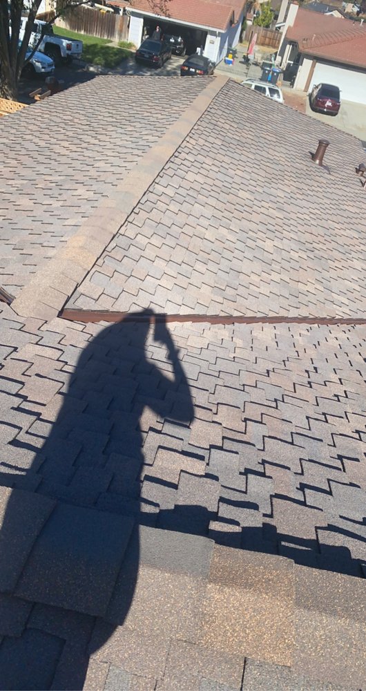 Slide of Aguilar Roofing