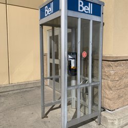 Walmart - An actual phone booth outside the store.