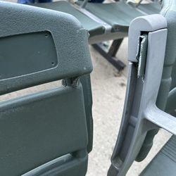 Back of the broken chair in the first row seat 12