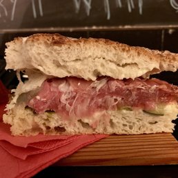Prosciutto, zucchini, and fresh cheese panini sandwich